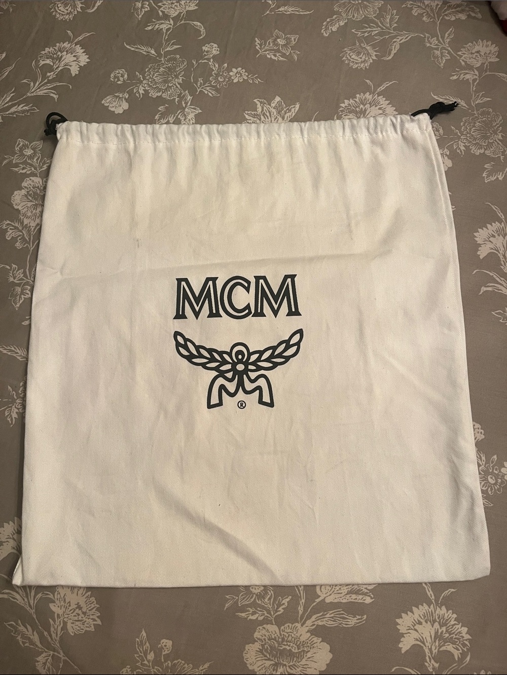 MCM White and Black Logo Drawstring Dust Bag with cards
